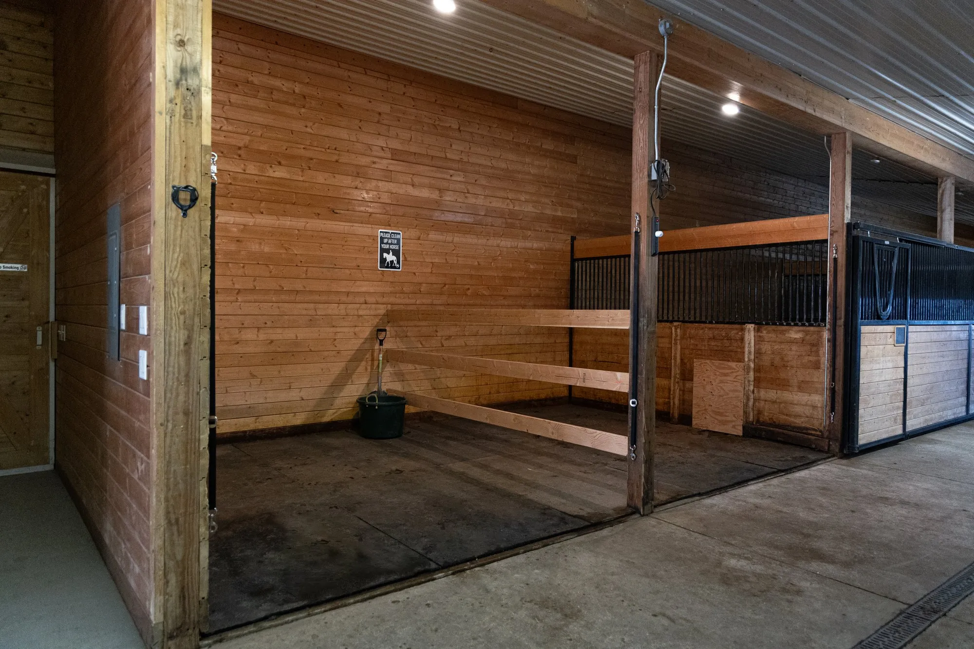 Inside the heated barn, down the stall aisle.