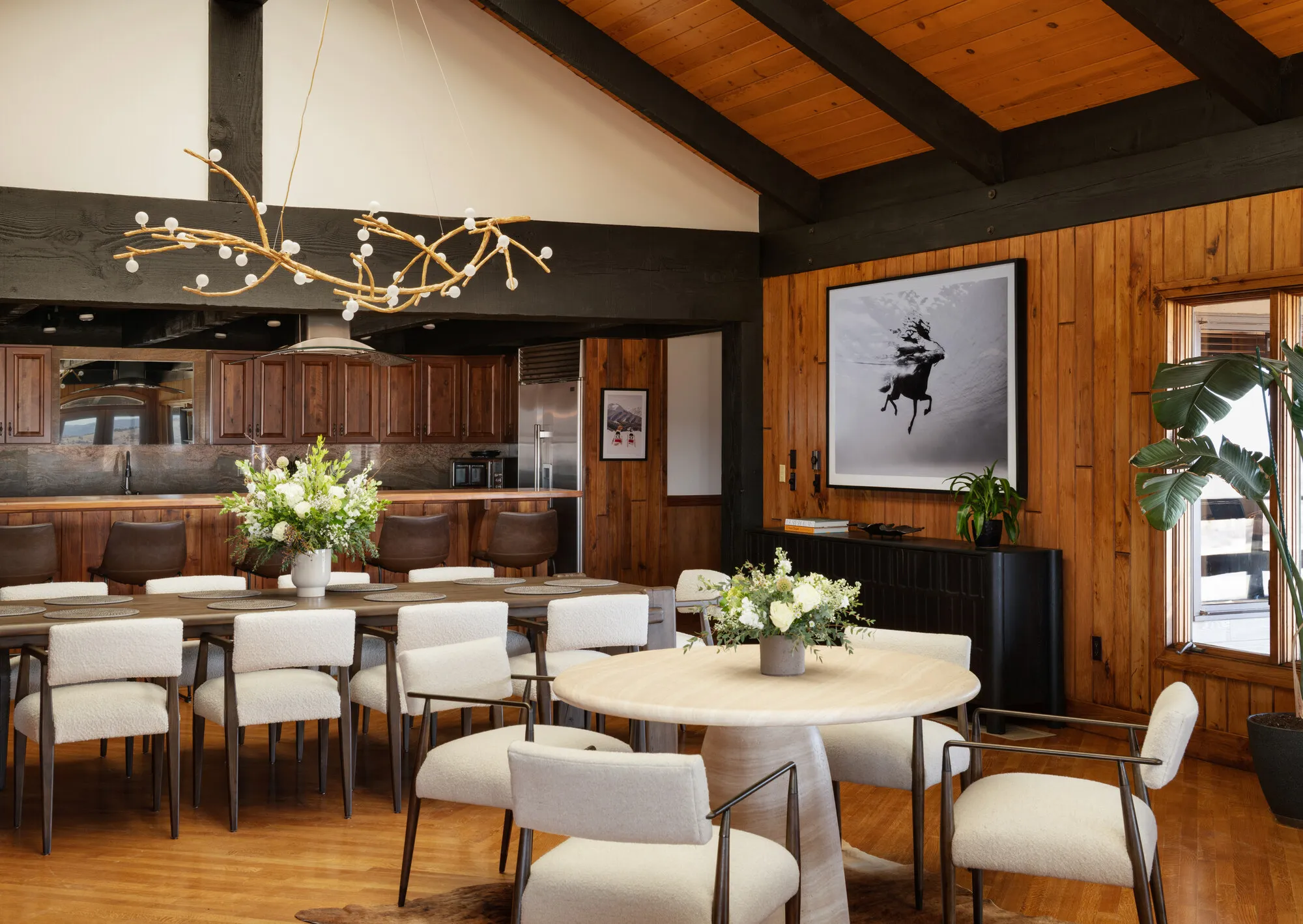 Wolf range, Sub-Zero, and a table that seats the whole booking.