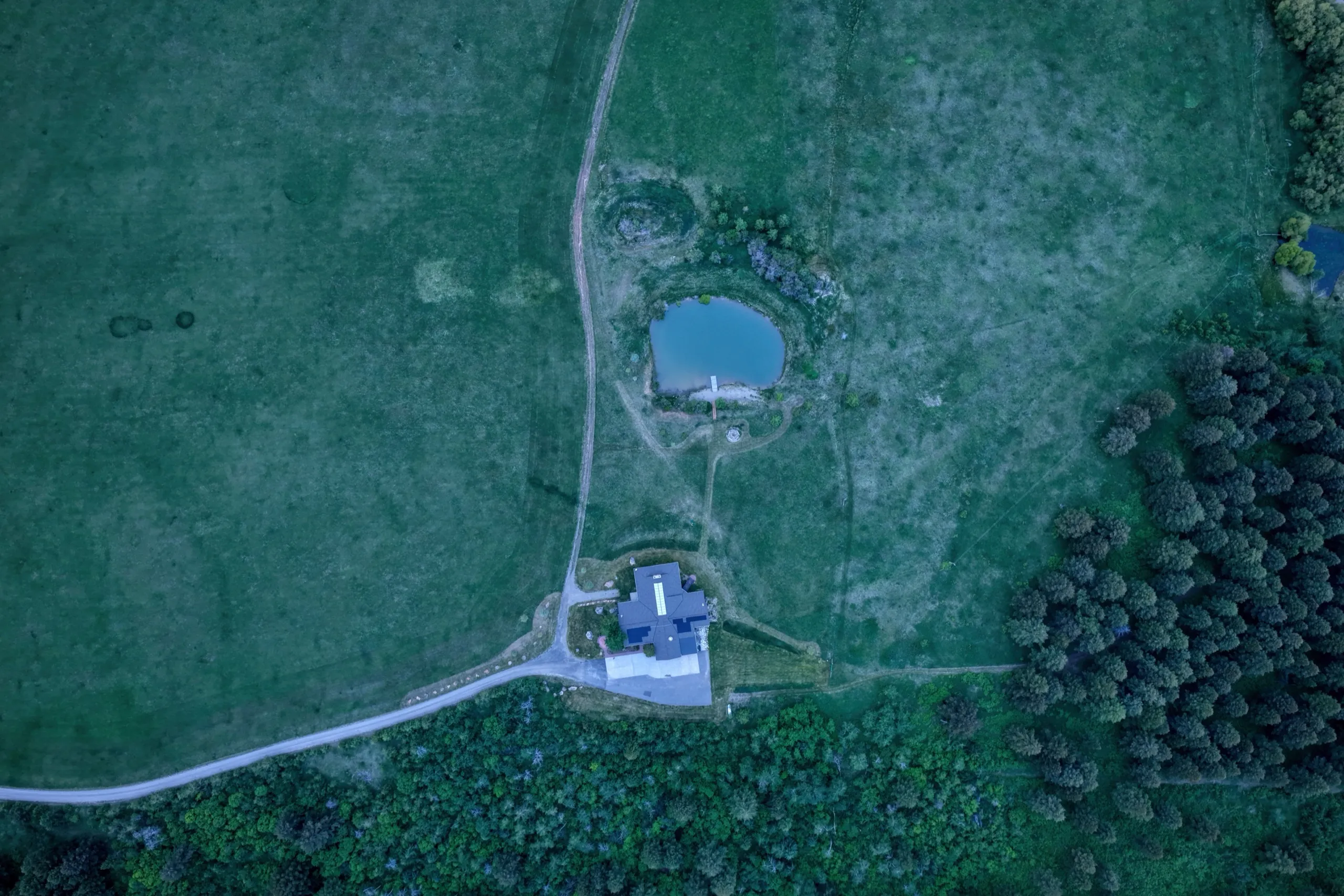 Aerial view of The Lodge and pond